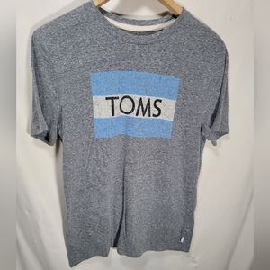TOMS size medium gray medium t-shirt with the TOMS logo on the front unisex